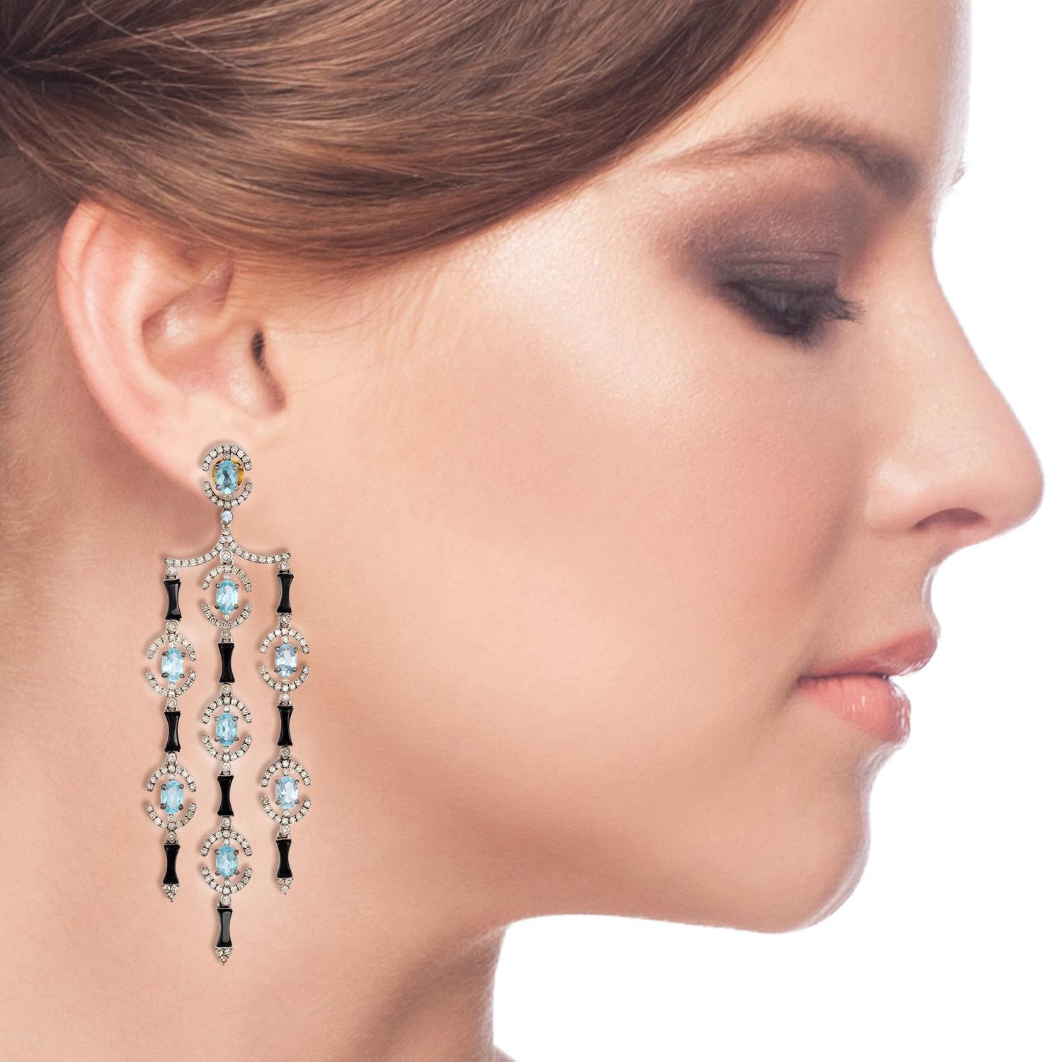 Cast from 18 karat gold & sterling silver, these beautiful earrings are hand set with 10.66 carats Aquamarine, 7.4 carats onyx and 3.49 carats of shimmering diamonds.

FOLLOW  MEGHNA JEWELS storefront to view the latest collection & exclusive
