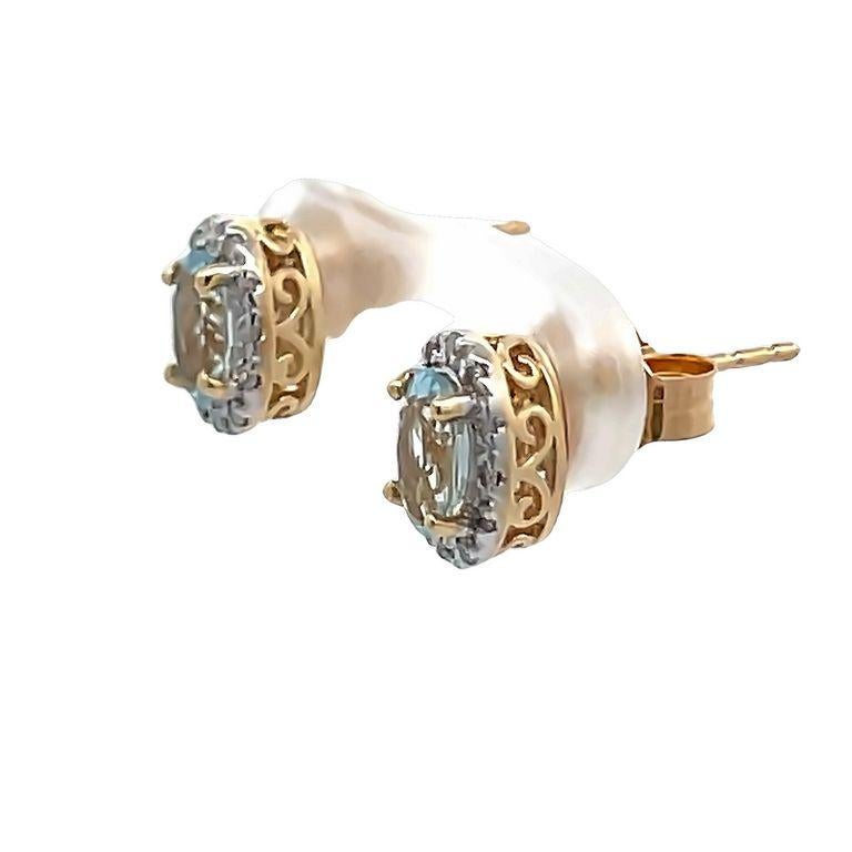 Women's Aquamarine Oval 0.60ct & Round Diamonds 0.10ct Stud Earrings in 14k Yellow Gold  For Sale