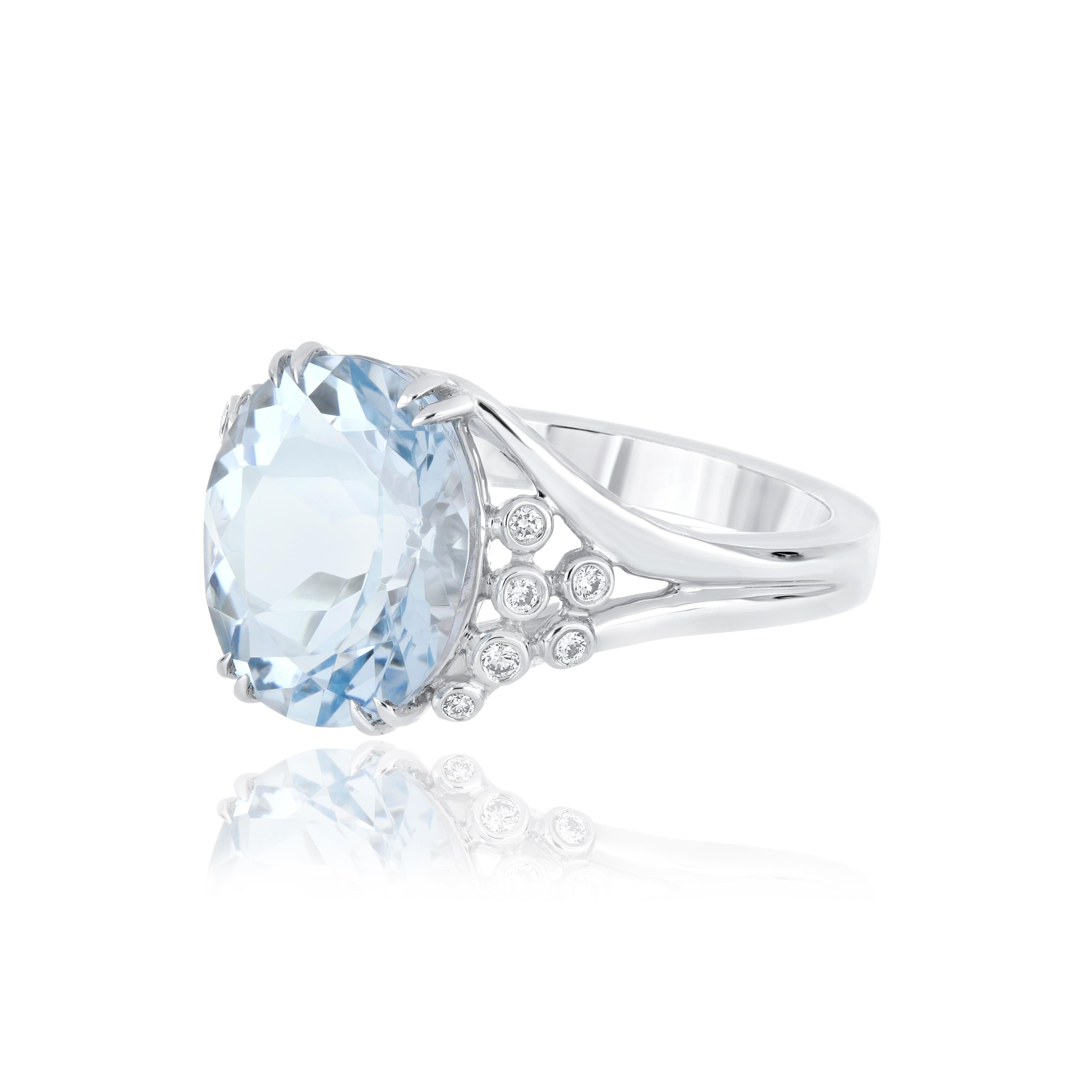 Oval Cut Aquamarine Oval and Diamond Studded Ring in 14 Karat White Gold For Sale