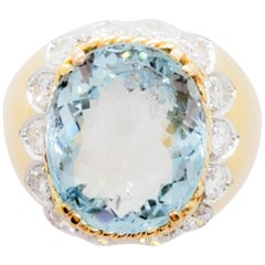 Aquamarine Oval and White Diamond Round Cocktail Ring in 18 Karat Gold