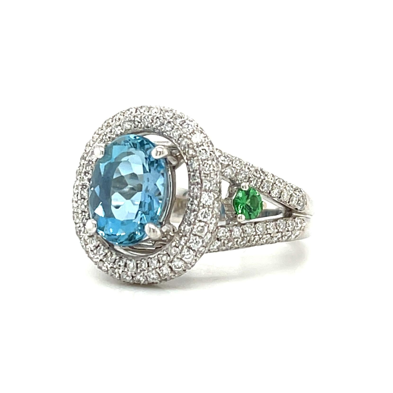 Oval Cut Aquamarine, Tsavorite Garnet and Diamond Halo Cocktail Ring in White Gold For Sale