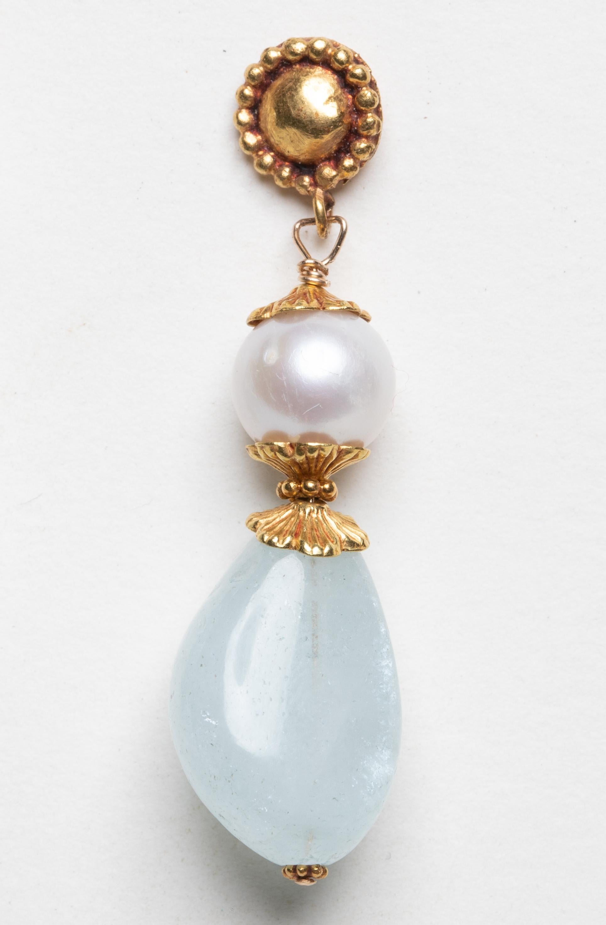 A tumbled aquamarine with fresh water pearls and 22K gold by Deborah Lockhart Phillips.  Post back for pierced ears.