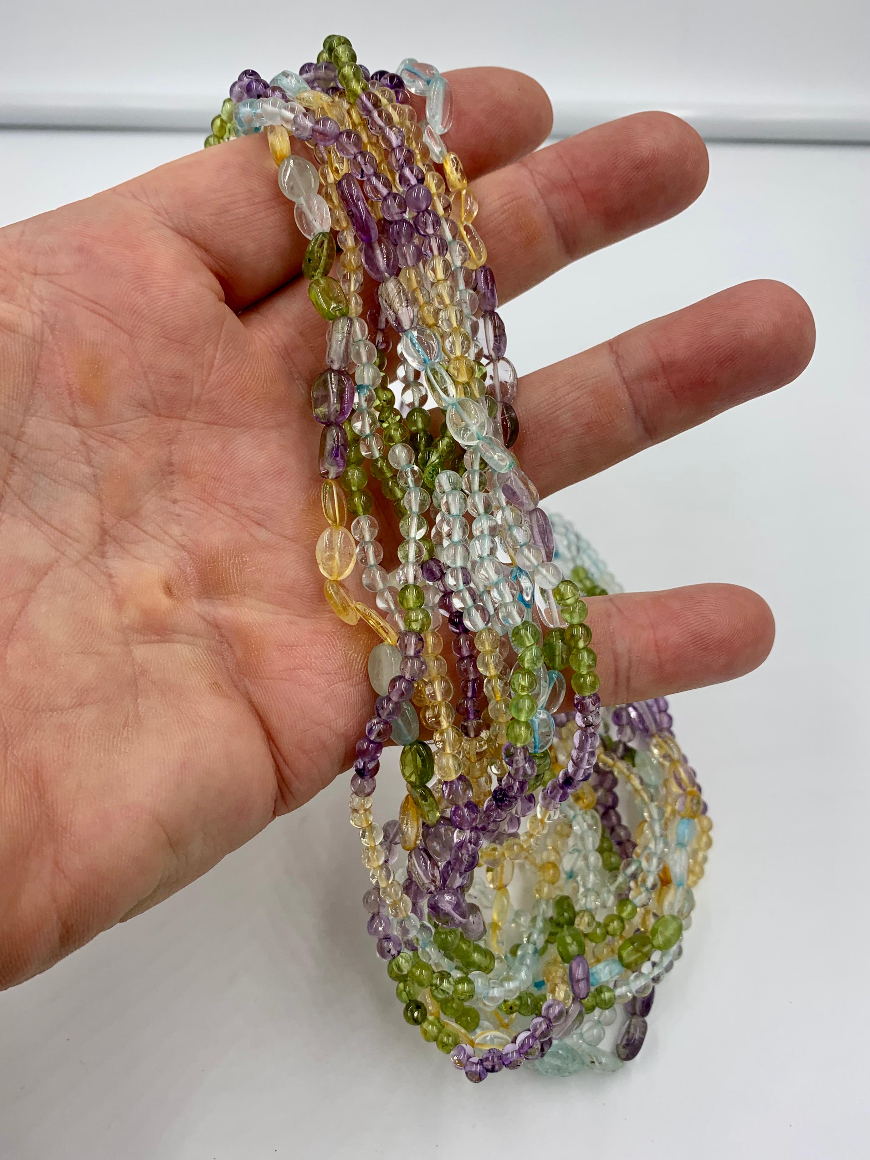 Aquamarine Peridot Citrine Amethyst Torsade Necklace 14 Karat Gold 11 Strand In Excellent Condition For Sale In New York, NY