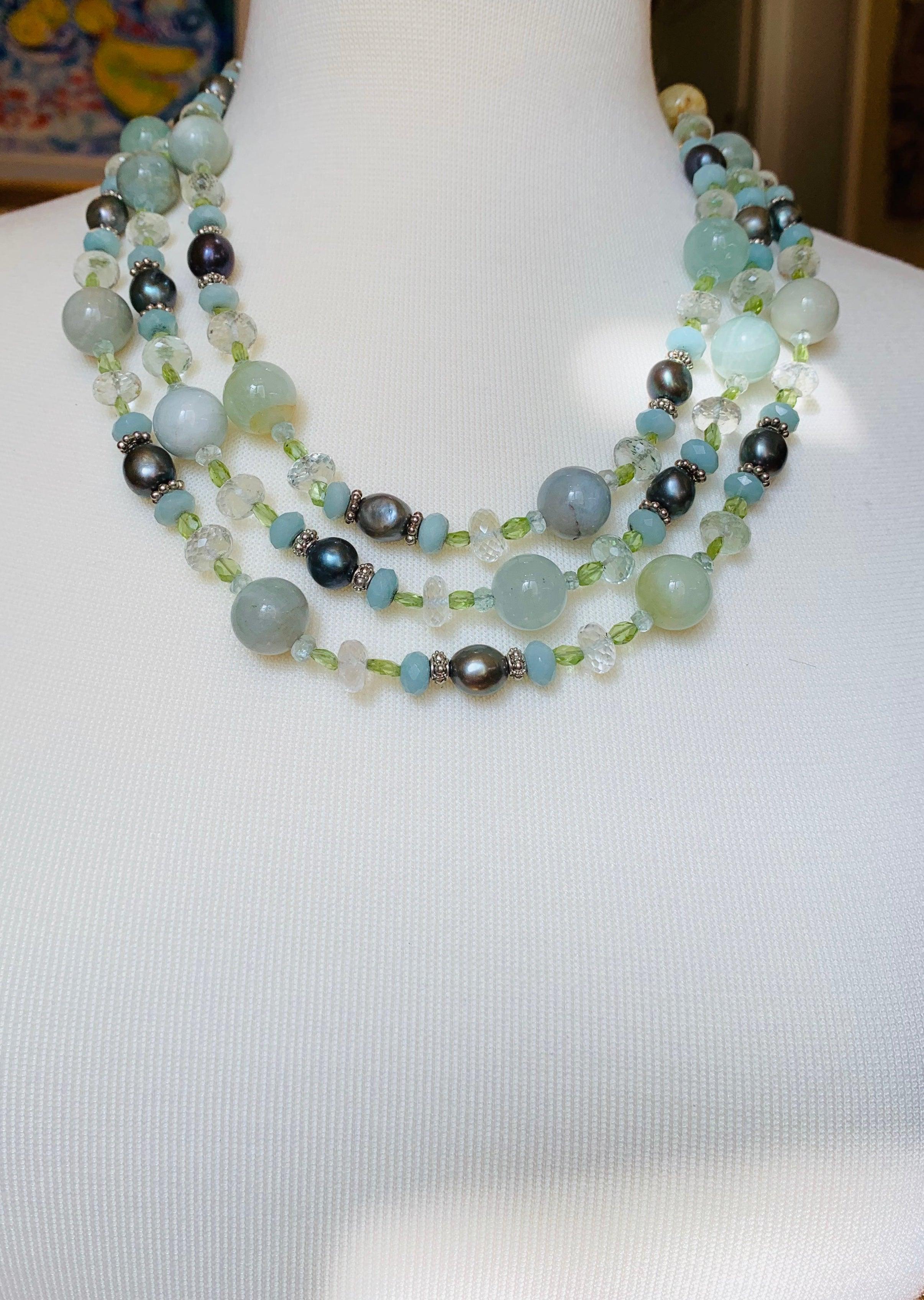 freshwater baroque pearls with mirror cut aquamarine and gold rondelles