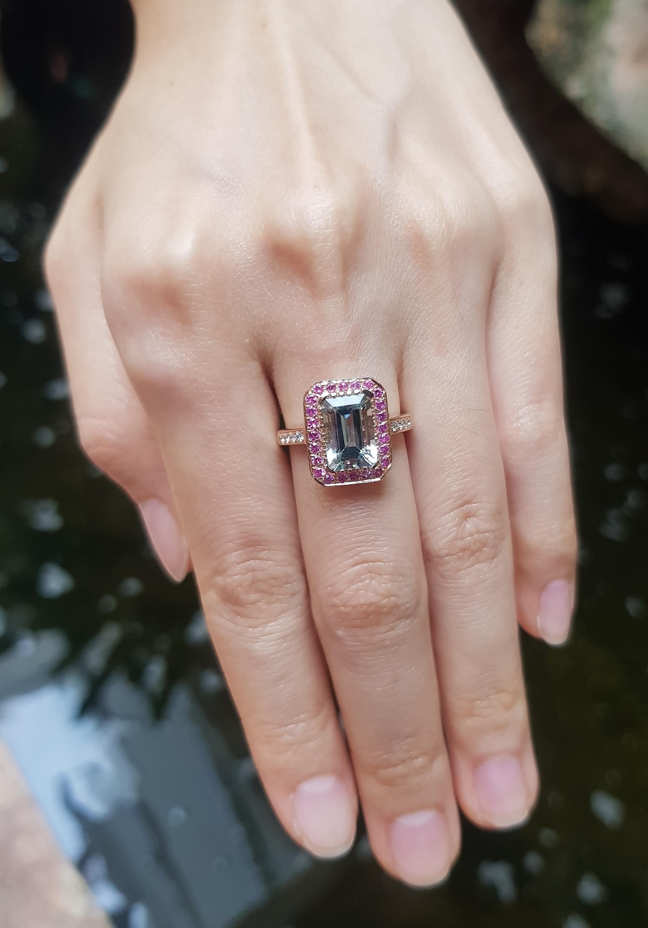 Aquamarine 2.08 carats, Pink Sapphire 0.57 carat and Diamond 0.10 carat Ring set in 18K Rose Gold Settings

Width:  1.1 cm 
Length: 1.4 cm
Ring Size: 53
Total Weight: 4.69 grams

