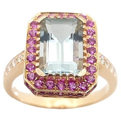 Ring aus 18 Karat Roségold mit Aquamarin, rosa Saphir und Diamant in Fassungen