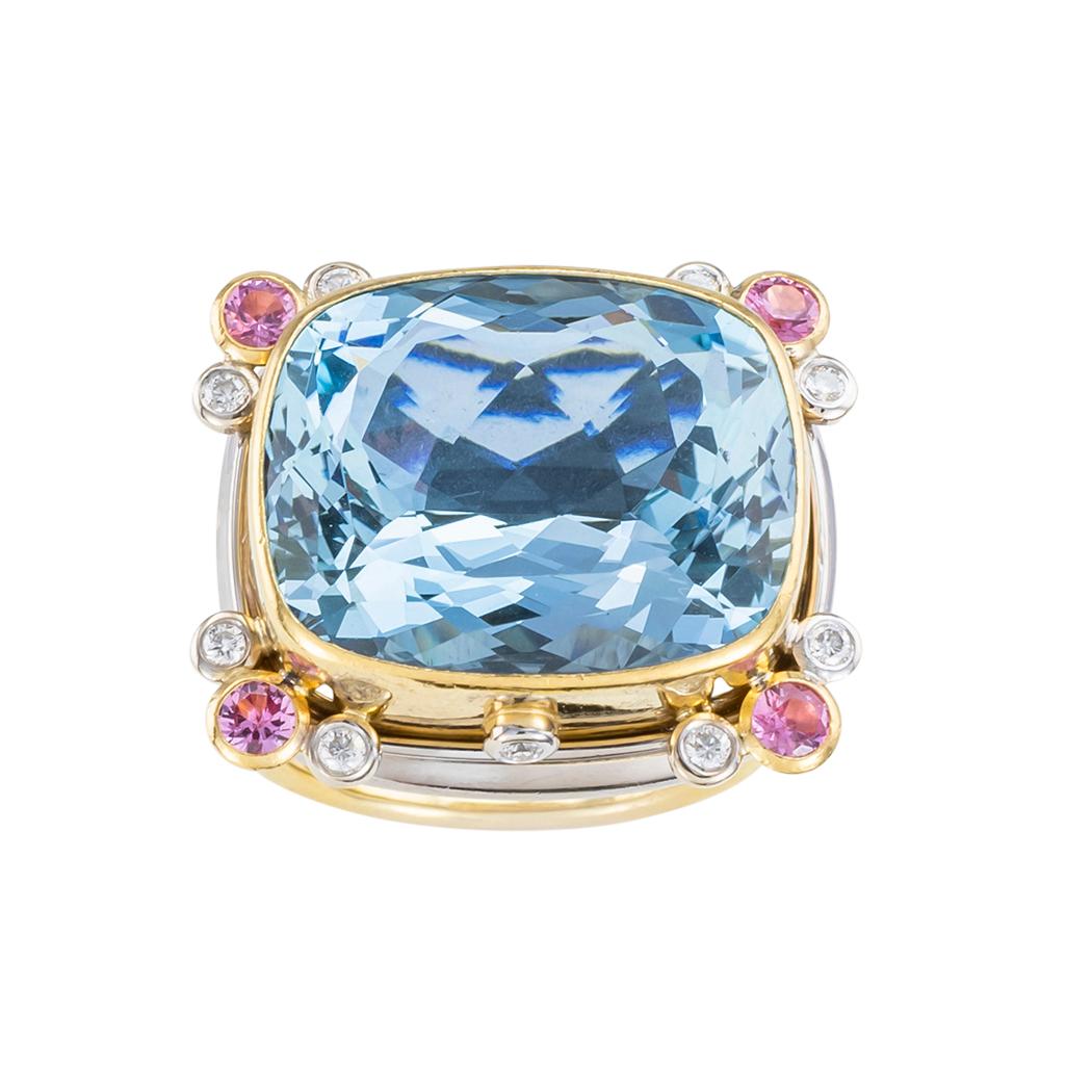Aquamarine Pink Sapphire Diamond Two Tone Gold Cocktail Ring

The Aquamarine Pink Sapphire Diamond Two-Tone Gold Cocktail Ring is a stunning piece of jewelry that exudes elegance and sophistication. Crafted with precision and attention to detail,
