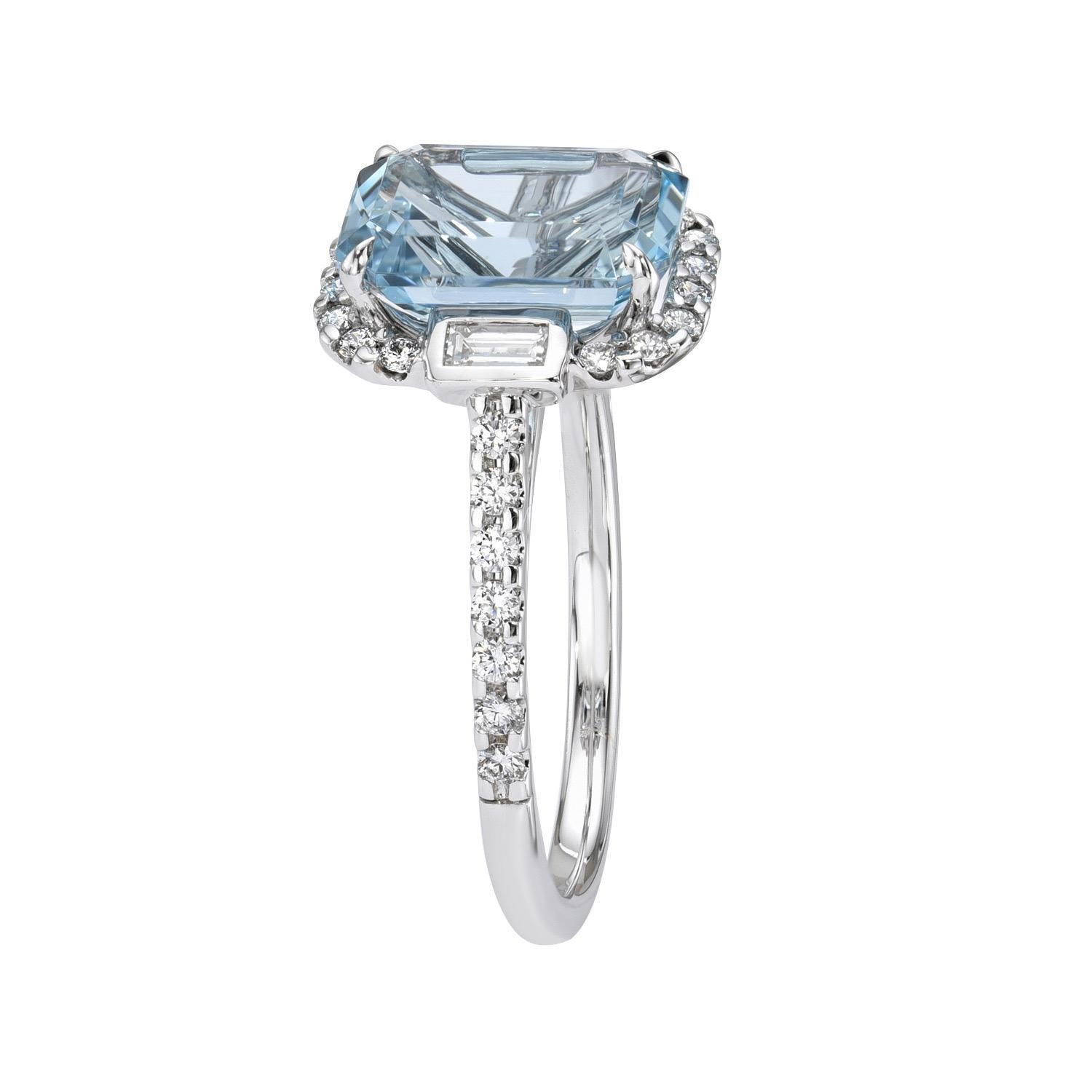 Marvelous 2.64 carat Aquamarine Emerald Cut, 18K white gold ring, decorated with a pair of 0.13 carat Baguette collection diamonds, and a total of 0.31 carat collection round brilliant diamonds.
Ring size 6.5. Resizing is complementary upon