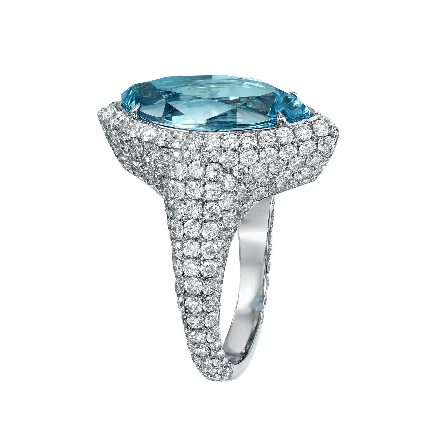 Exquisite 5.25 carat Aquamarine Marquise, platinum ring, decorated with round brilliant collection diamonds, weighing a total of 3.50 carats.
Ring size 6. Resizing is complementary upon request.
Crafted by extremely skilled hands in the USA.
Returns