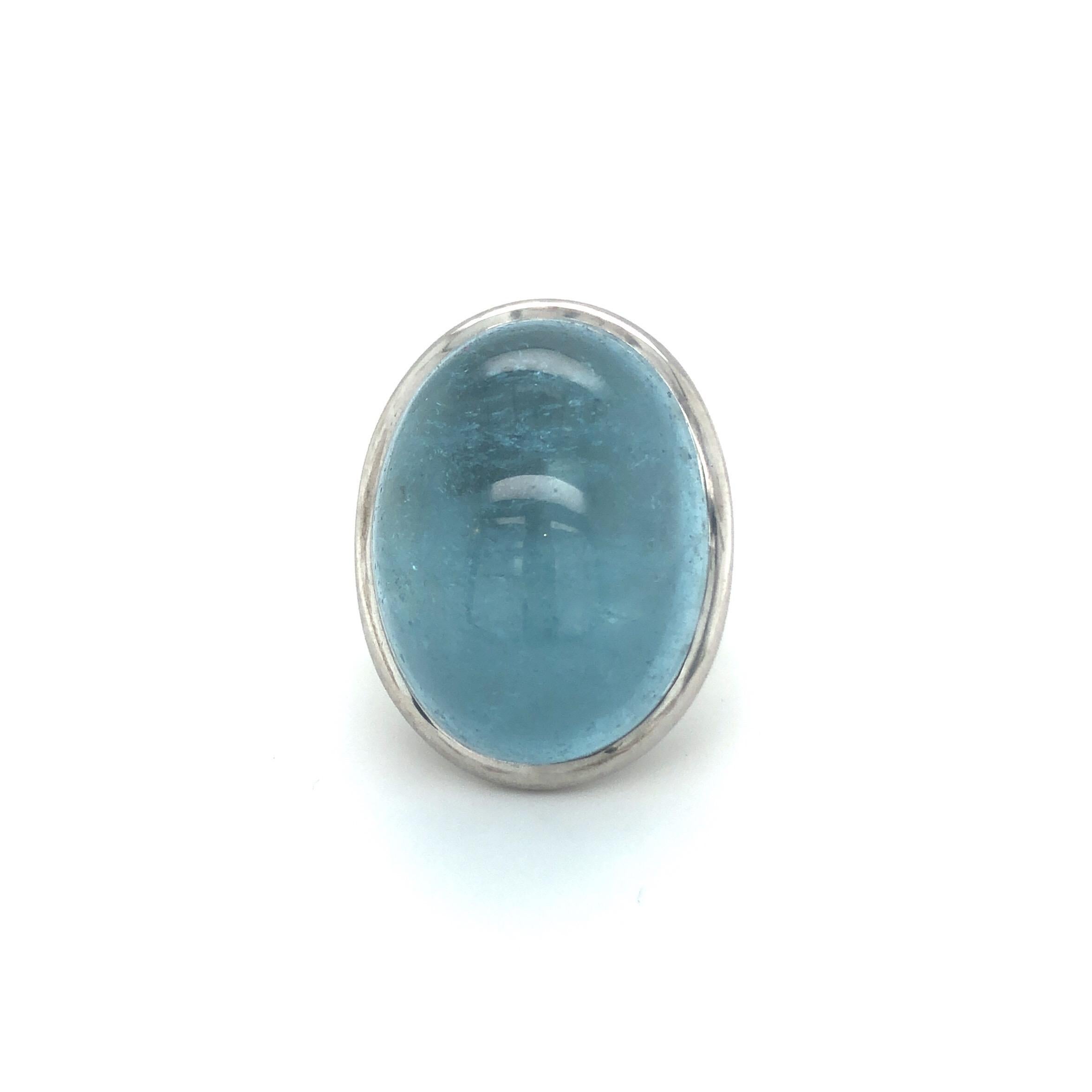 18 karat white gold aquamarine ring by Péclard.
This statement ring by renowned Swiss jeweller Péclard features a bold Aquamarine cabochon of approximately 55 carats.
The setting is crafted in 18 karat white gold. The contrast between the sturdy