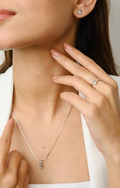 Anello, ciondolo e orecchini in oro giallo massiccio 18k con acquamarina