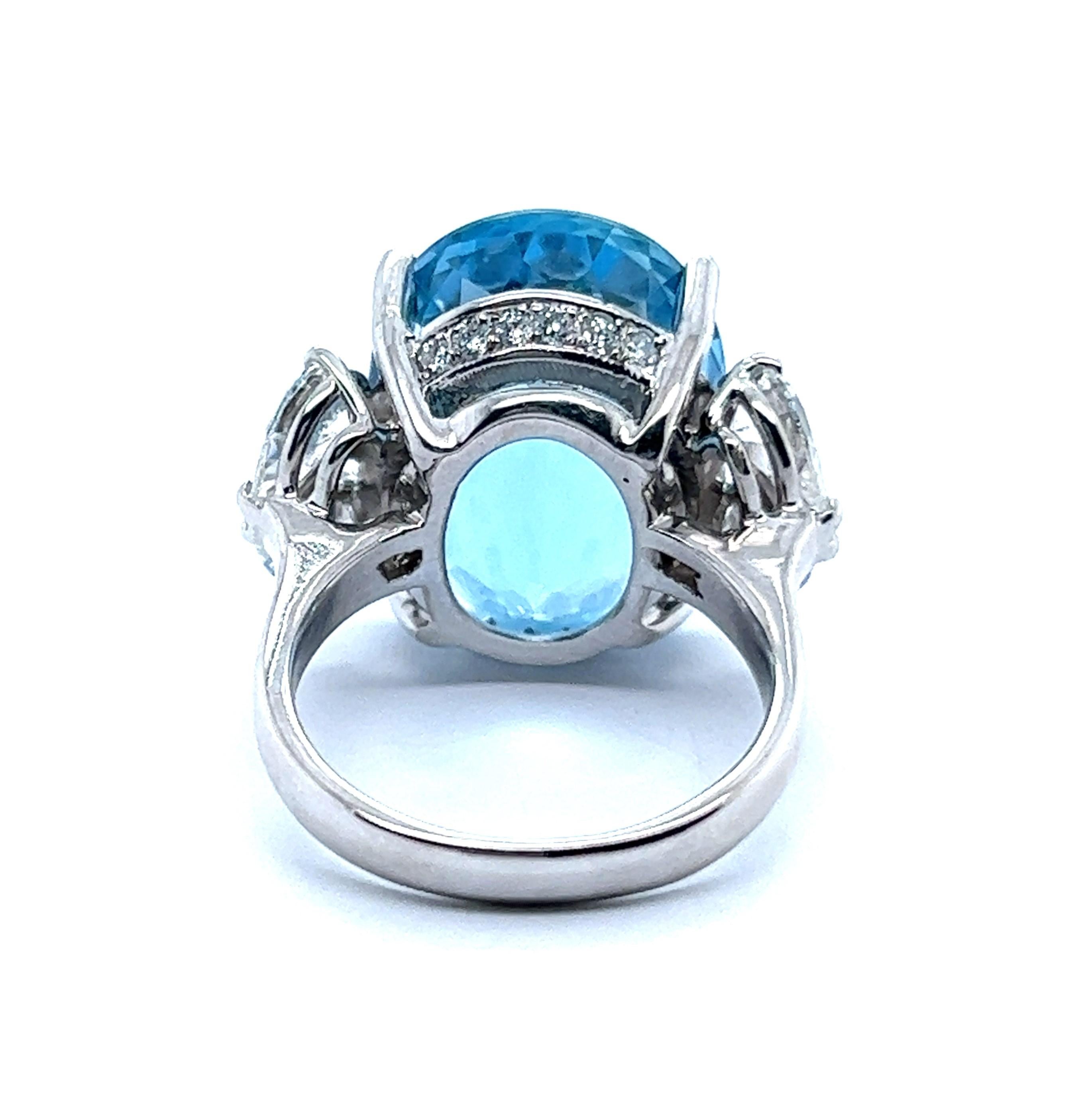 Oval Cut Aquamarine Ring with Diamonds in 14 Karat White Gold For Sale
