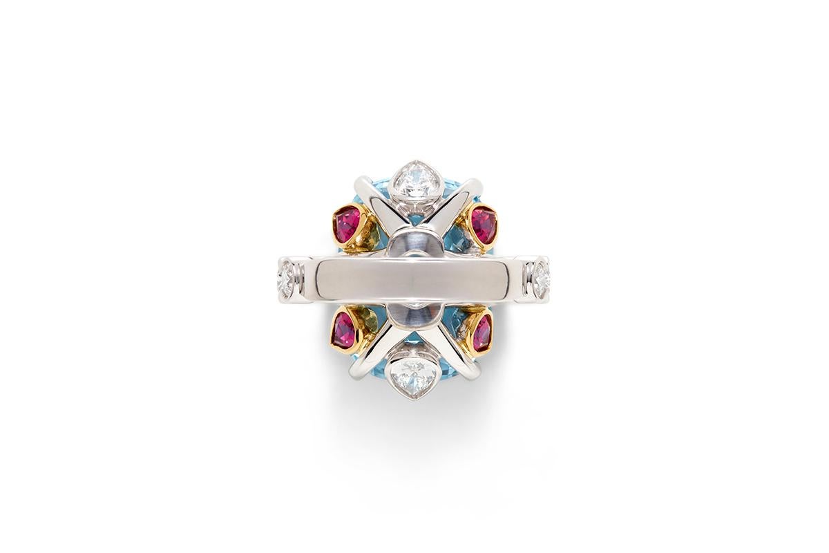 Blossom Collection, Aquamarine, Rubelite and Diamond Ring. The Blossom Collection coloured gemstones are a uniquely designed cut of an oval cushion cut top with a high crown to emulate an antique Georgian style with a brilliant cut base to maximise