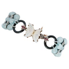 Aquamarine, Rubies, White Stones, Rose Gold and Silver Bracelet.