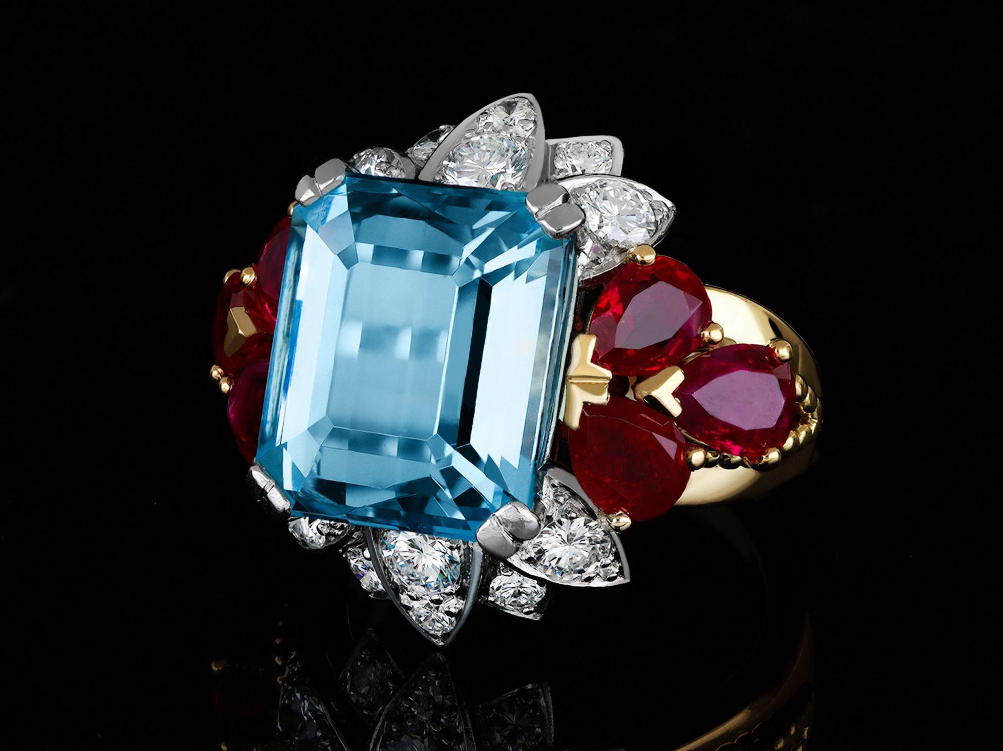 Emerald Cut Aquamarine, ruby and diamond cocktail ring, circa 1950. For Sale
