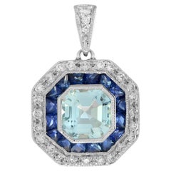 Ciondolo in stile Art Deco con zaffiro, acquamarina e diamante in oro bianco 14 carati
