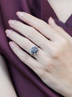 Anello di fidanzamento con acquamarina, zaffiro e diamanti in oro bianco 14K