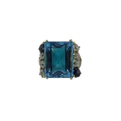 Blue Topaz, Sapphire and Diamond Ring