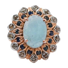 Aquamarine, Sapphires, Diamonds, Rose Gold and Silver Ring.