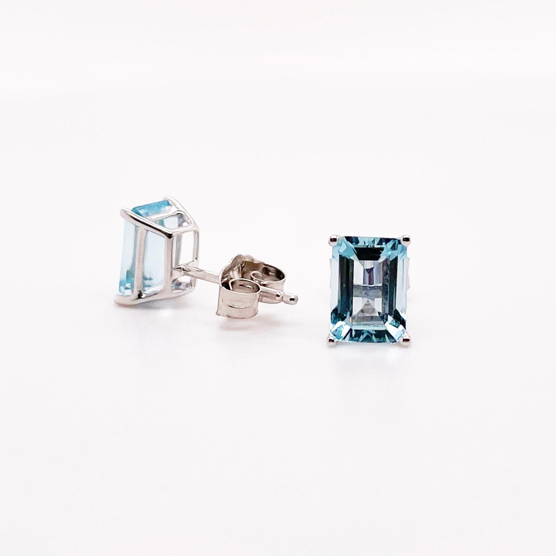 Aquamarines, aquas, genuine and natural gemstones. These matching aquas are exquisite and would look great on any earlobe. They are delicately set in a four prong basket with a post and back on each. To find two aquas that match in color and size is