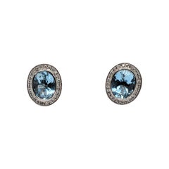 Aquamarine Stud Earrings with a Diamond Halo in 14k White Gold