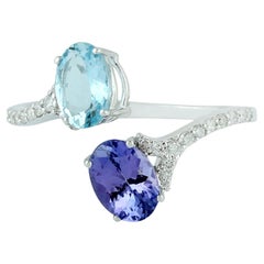 Anello bypass con acquamarina e tanzanite e diamanti in oro bianco 18 carati
