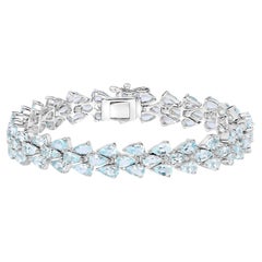 Bracelet de tennis en aigue-marine 14.1 carats en argent sterling