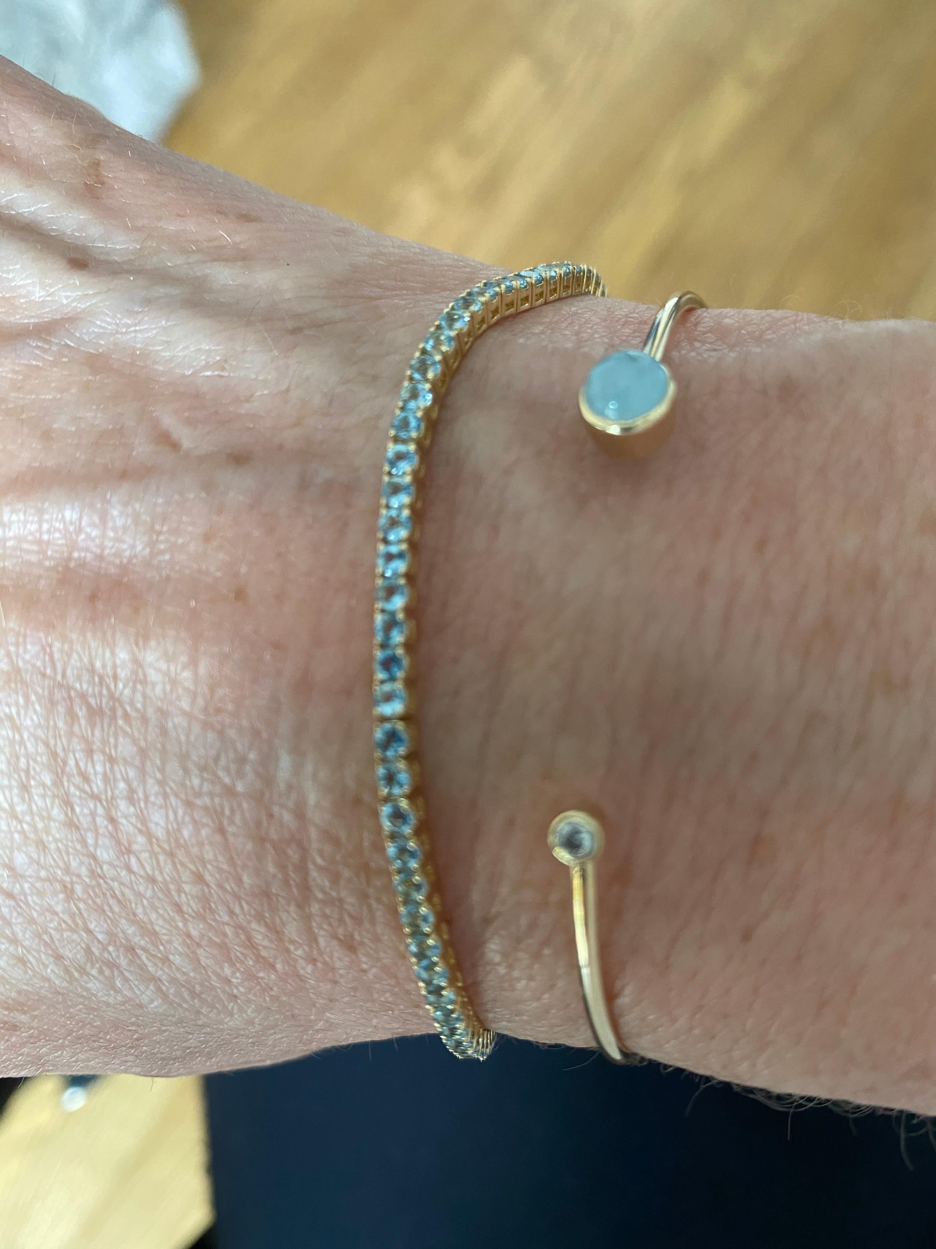 aquamarine tennis bracelet gold