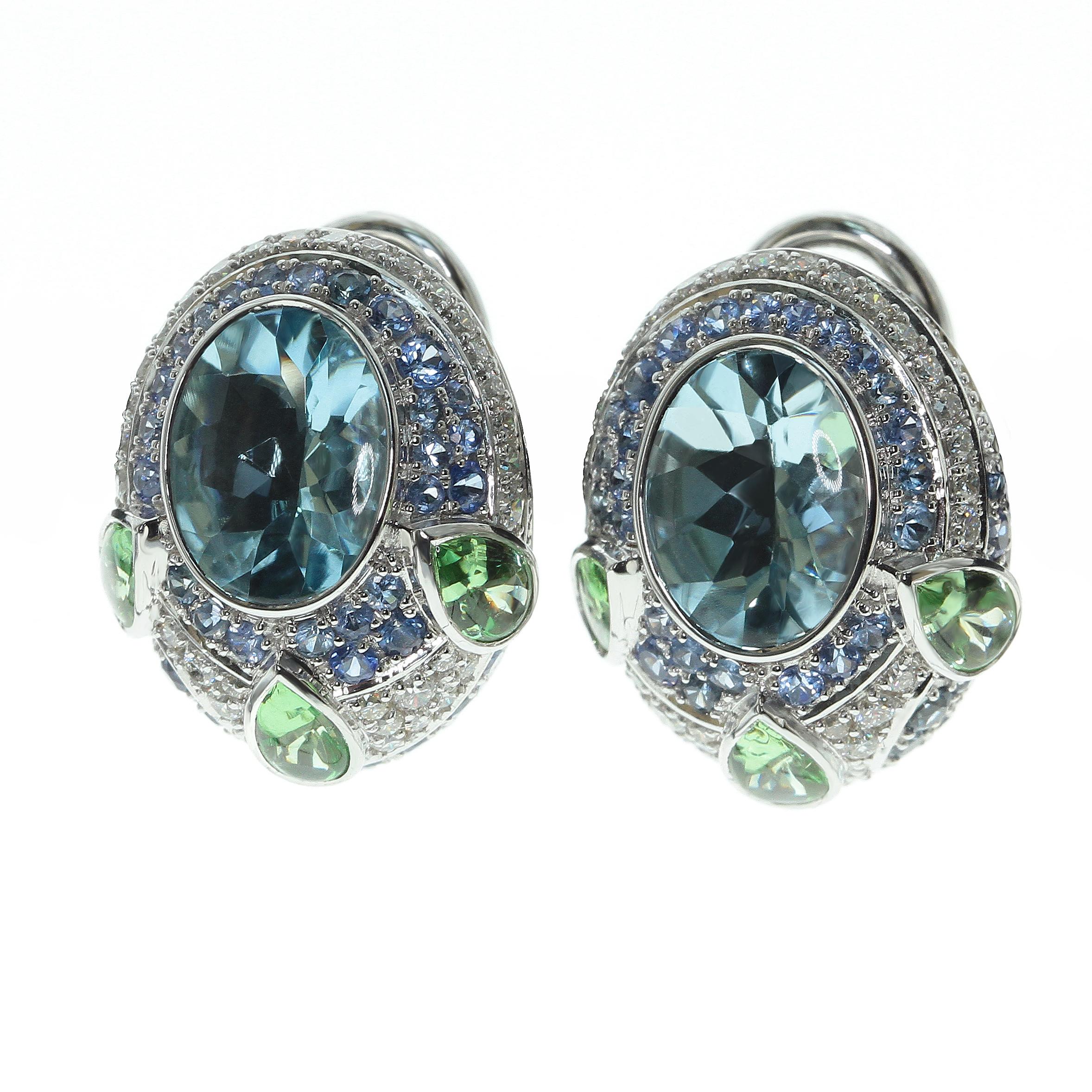 Aquamarine Tsavorite Diamonds Sapphire 18 Karat White Gold Oriental Eairrngs 

Aquamarine have bufftop Oval cut, the crown is cabochon and pavilion is faceted.
This cut looks very vibrant with the Aquamarine, Tsavorites are supported the color