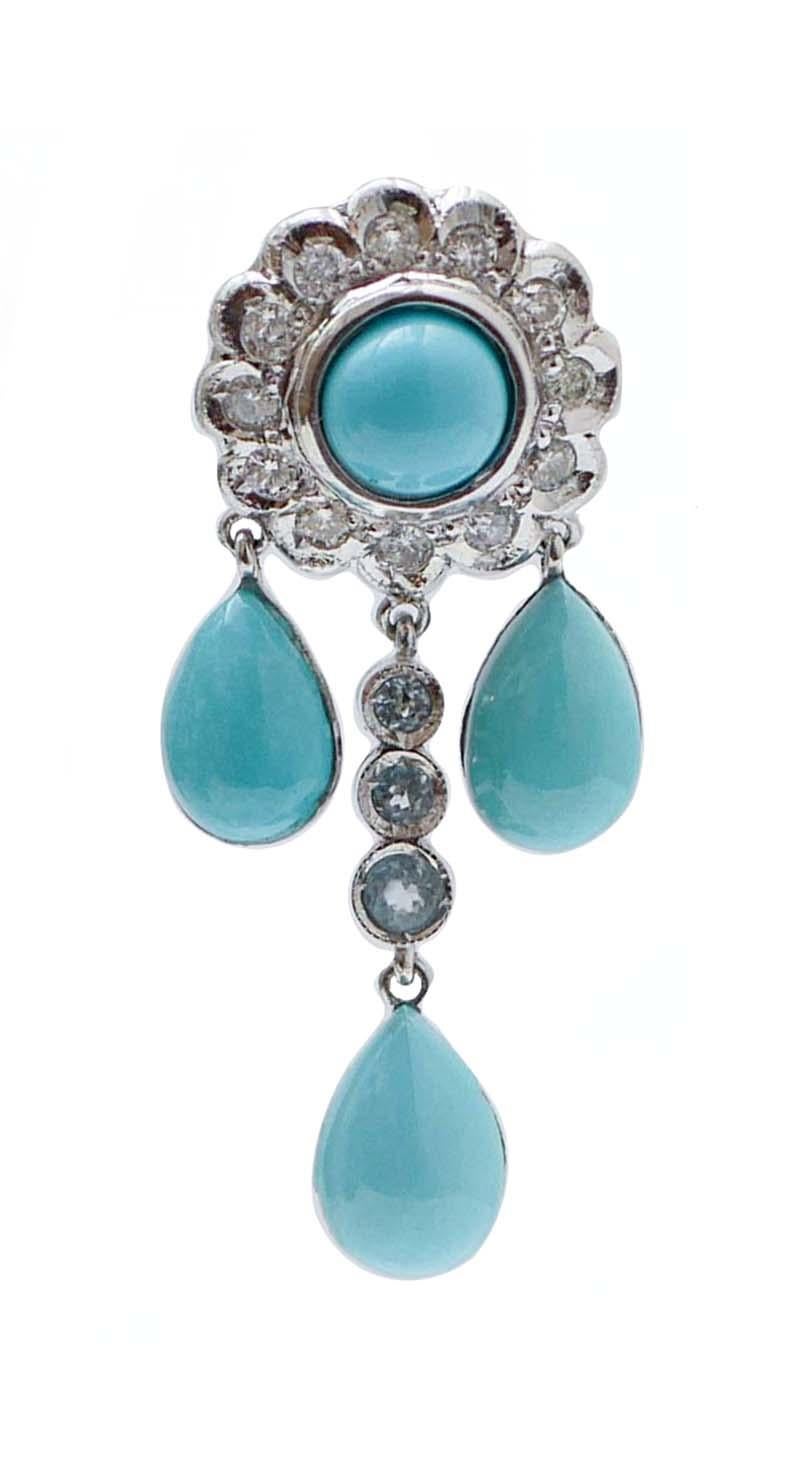 Wunderschöne Ohrringe in Platinstruktur mit einer Blume aus Diamanten und  ein zentrales Türkis im oberen Teil. Als Anhänger drei tropfenförmige Türkise und eine Struktur mit drei Aquamarinen.
Diese Ohrringe wurden von italienischen
