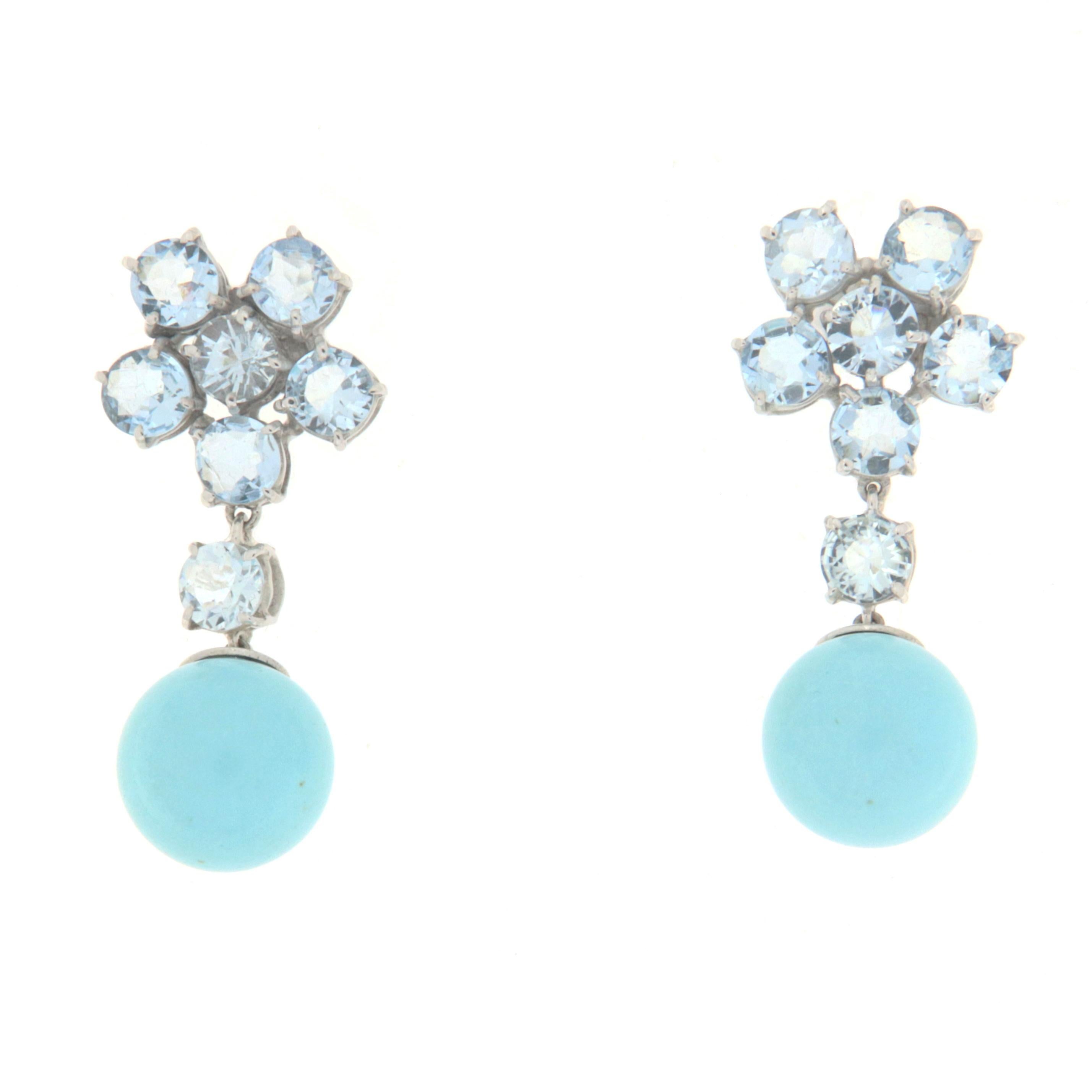 Fantastic earring made entirely by hand by expert master craftsmen. There are two sphere turquoise and aquamarines . Made of 18 Karat white gold.
An earring to be exhibited on any occasion, simple but at the same time very impactful, in short, a