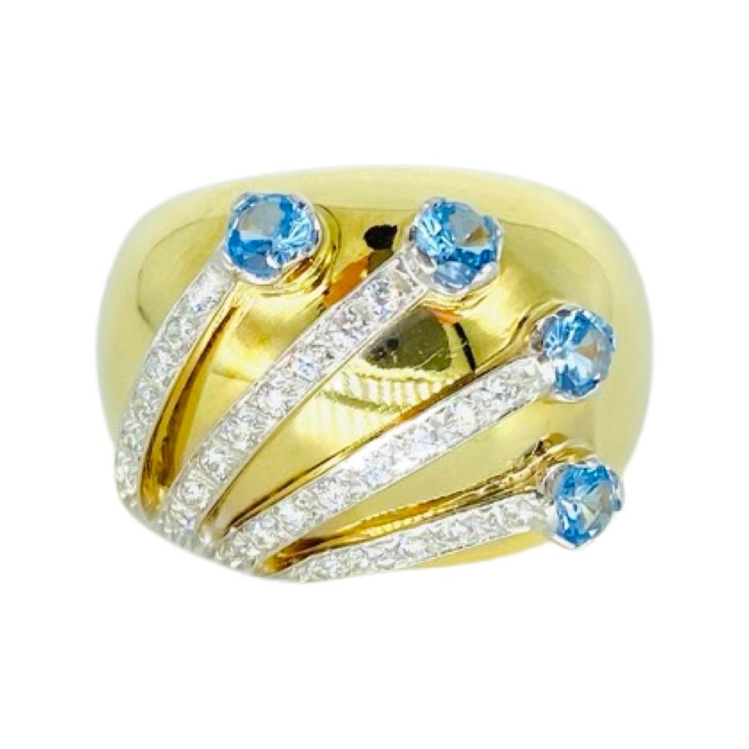 Aquamarine Water Splash Design 18k Gold Cocktail Cluster Wide Ring. Very nice deign like a water splash with aquamarine gemstones used in this ring to resemble the aqua ocean. The ring measures 13mm in height and is a size 7. The ring weights 9.8