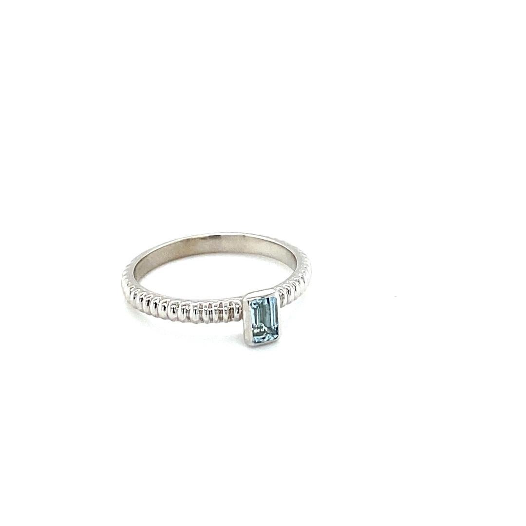 Cute and dainty everyday Aquamarine white gold ring

Straight baguette cut Aquamarine weighs 0.29 carats
14K White Gold is 2.7 grams
Ring size is 7 and can be resized at no extra charge