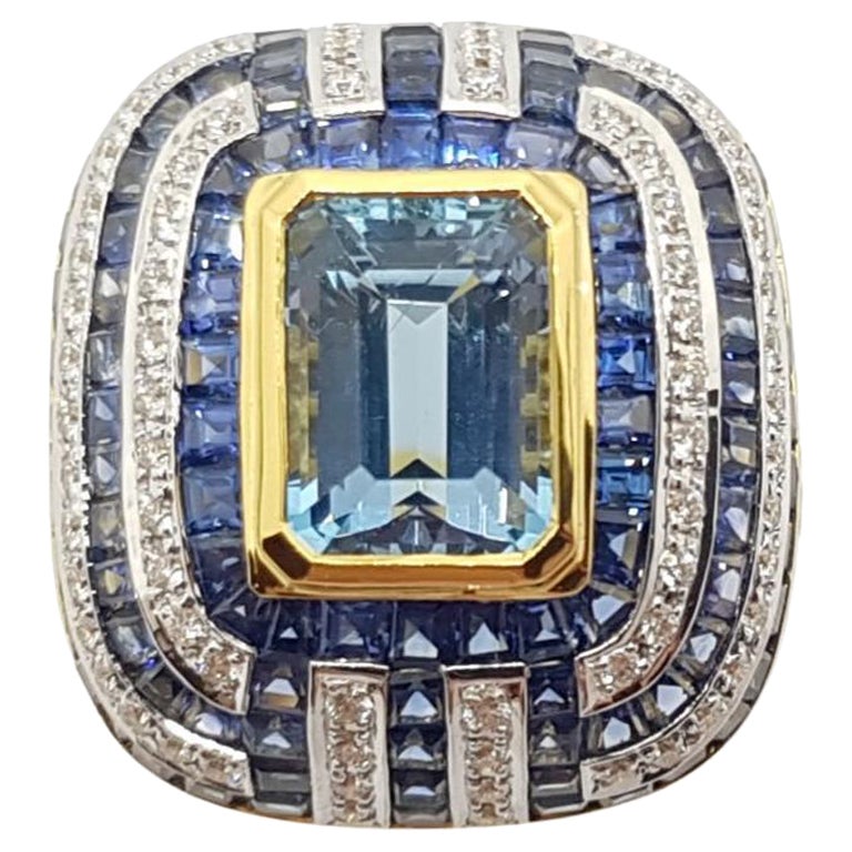 Anello con acquamarina, zaffiro blu e diamante incastonati in oro 18 carati in vendita