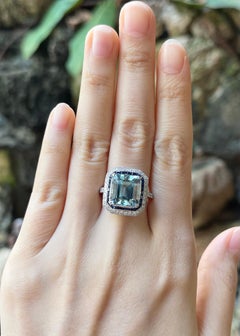 Anello con acquamarina, zaffiro blu e diamante con montatura in oro bianco 18K