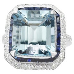 Anello con acquamarina, zaffiro blu e diamante con montatura in oro bianco 18K