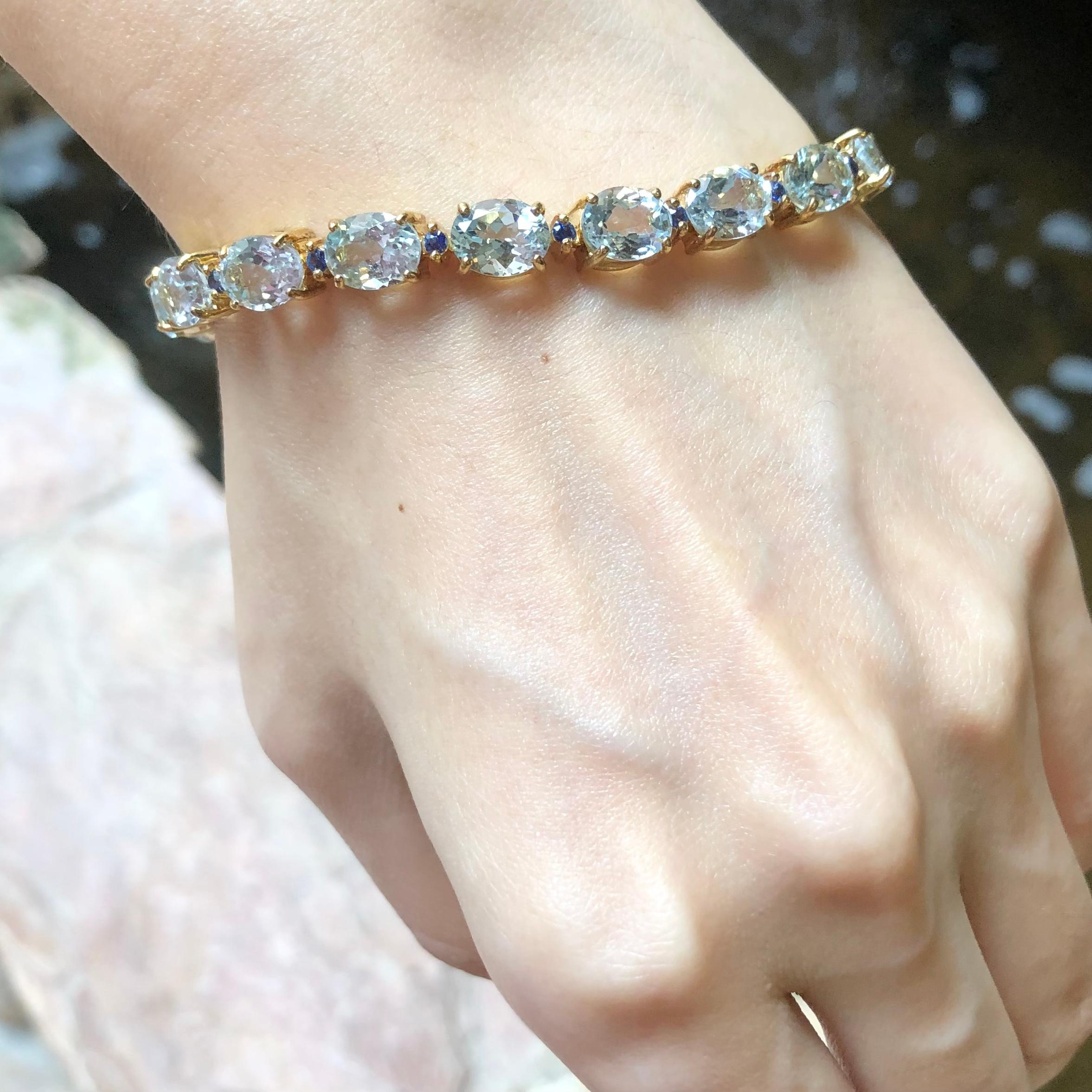 Aquamarin 21,59 Karat mit blauem Saphir  0.70 Karat Armband in 18 Karat Goldfassung

Breite:  0.6 cm 
Länge: 18,0 cm
Gesamtgewicht: 22,46 Gramm

