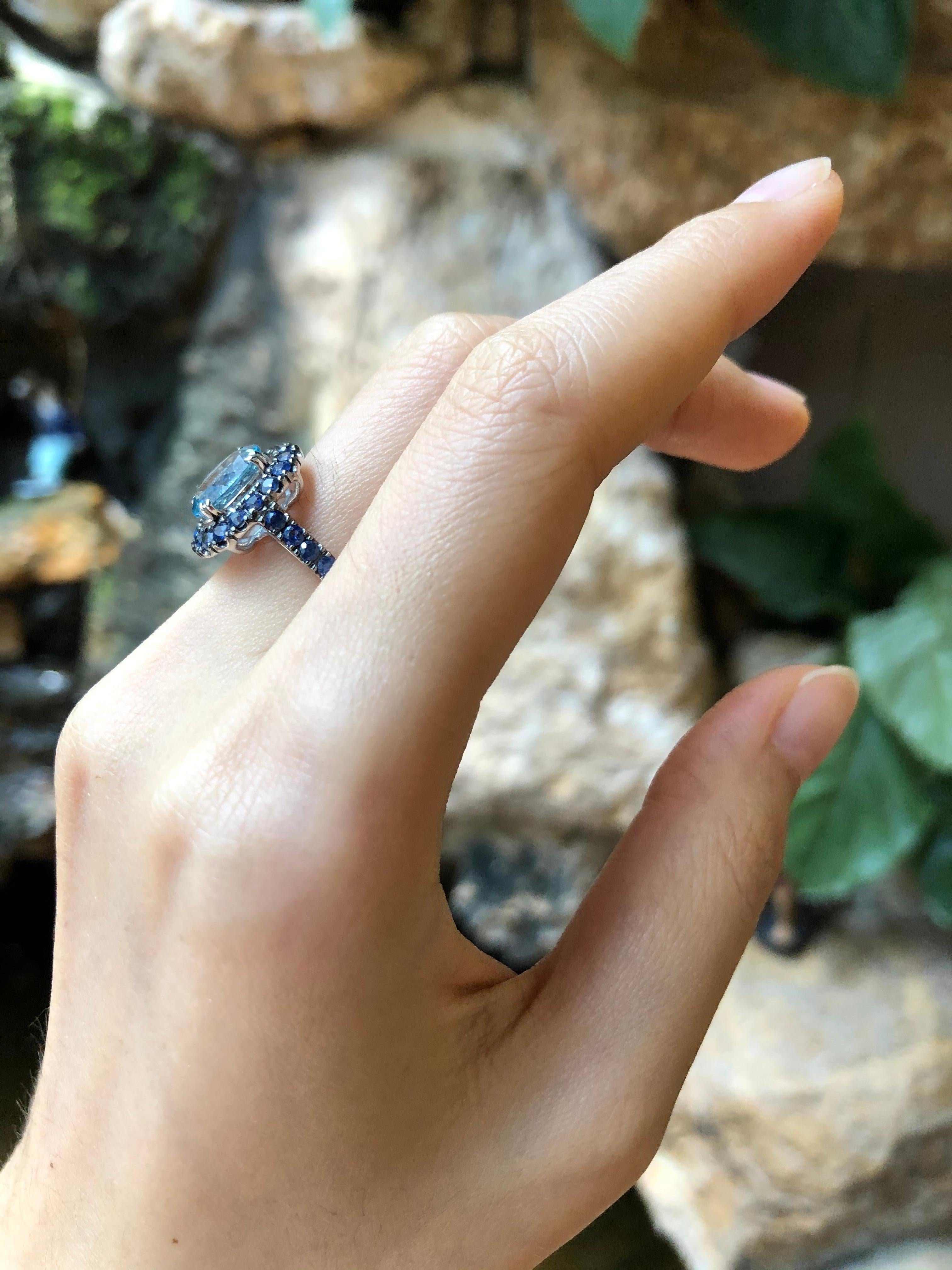 Contemporary Aquamarine with Blue Sapphire Ring Set in 18 Karat White Gold Settings