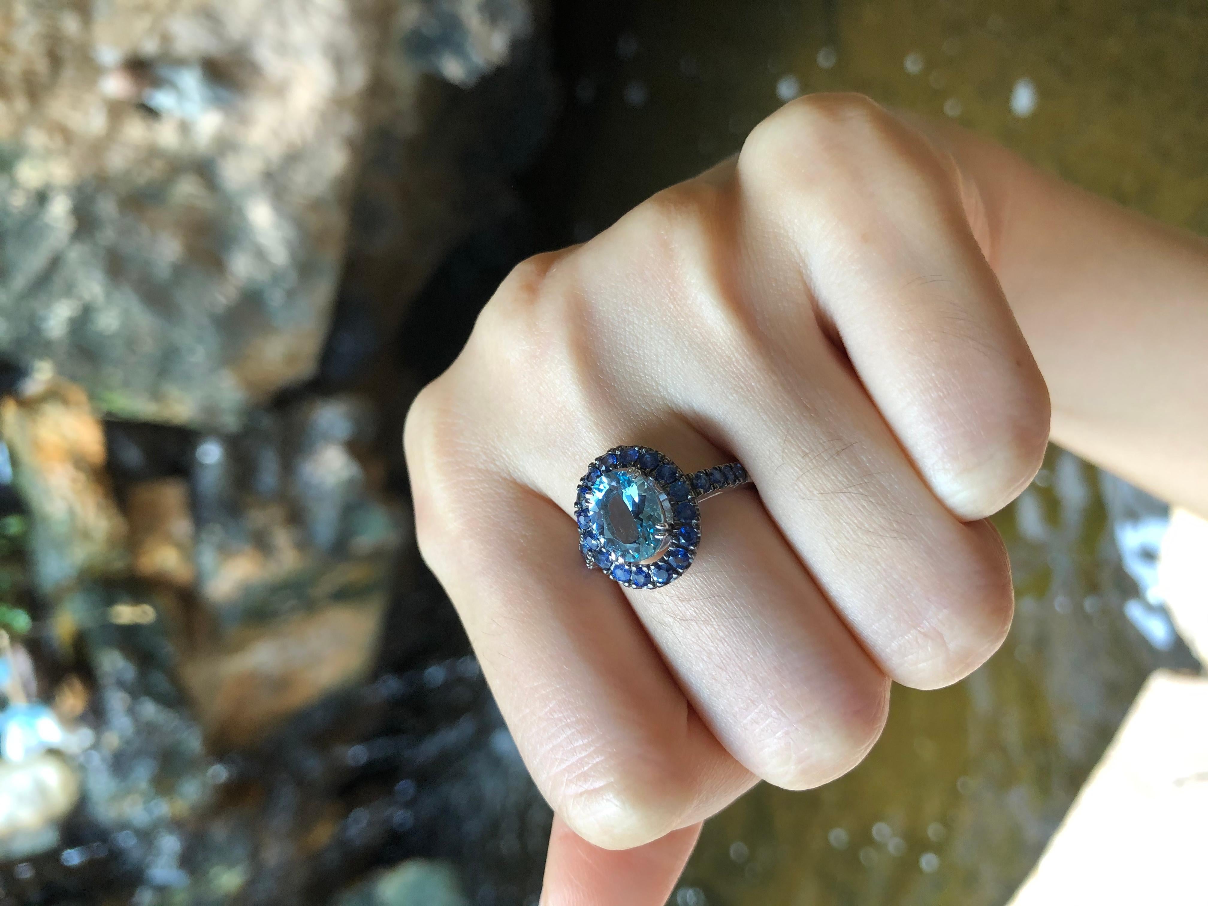 Oval Cut Aquamarine with Blue Sapphire Ring Set in 18 Karat White Gold Settings