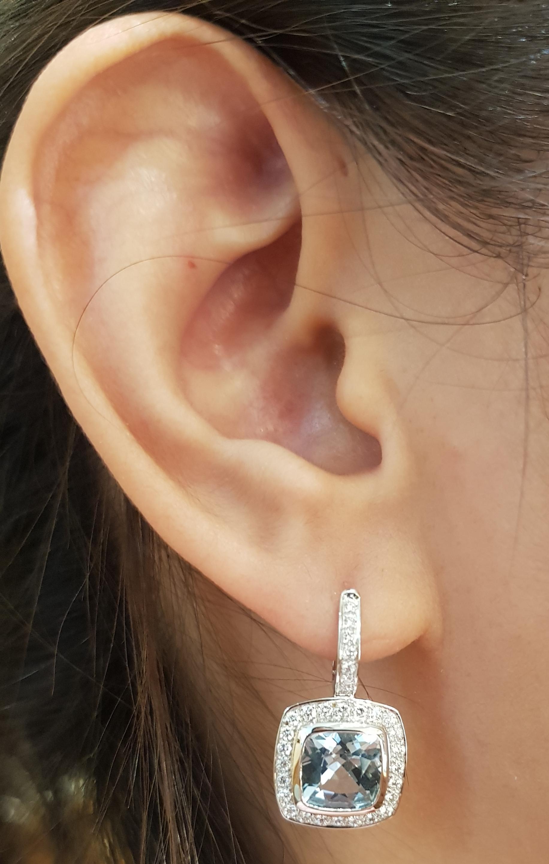 Aquamarine 3.37 carats with Diamond 0.58 carat Earrings set in 18 Karat White Gold Settings

Width:  1.3 cm 
Length:  2.3 cm
Total Weight: 7.56 grams

