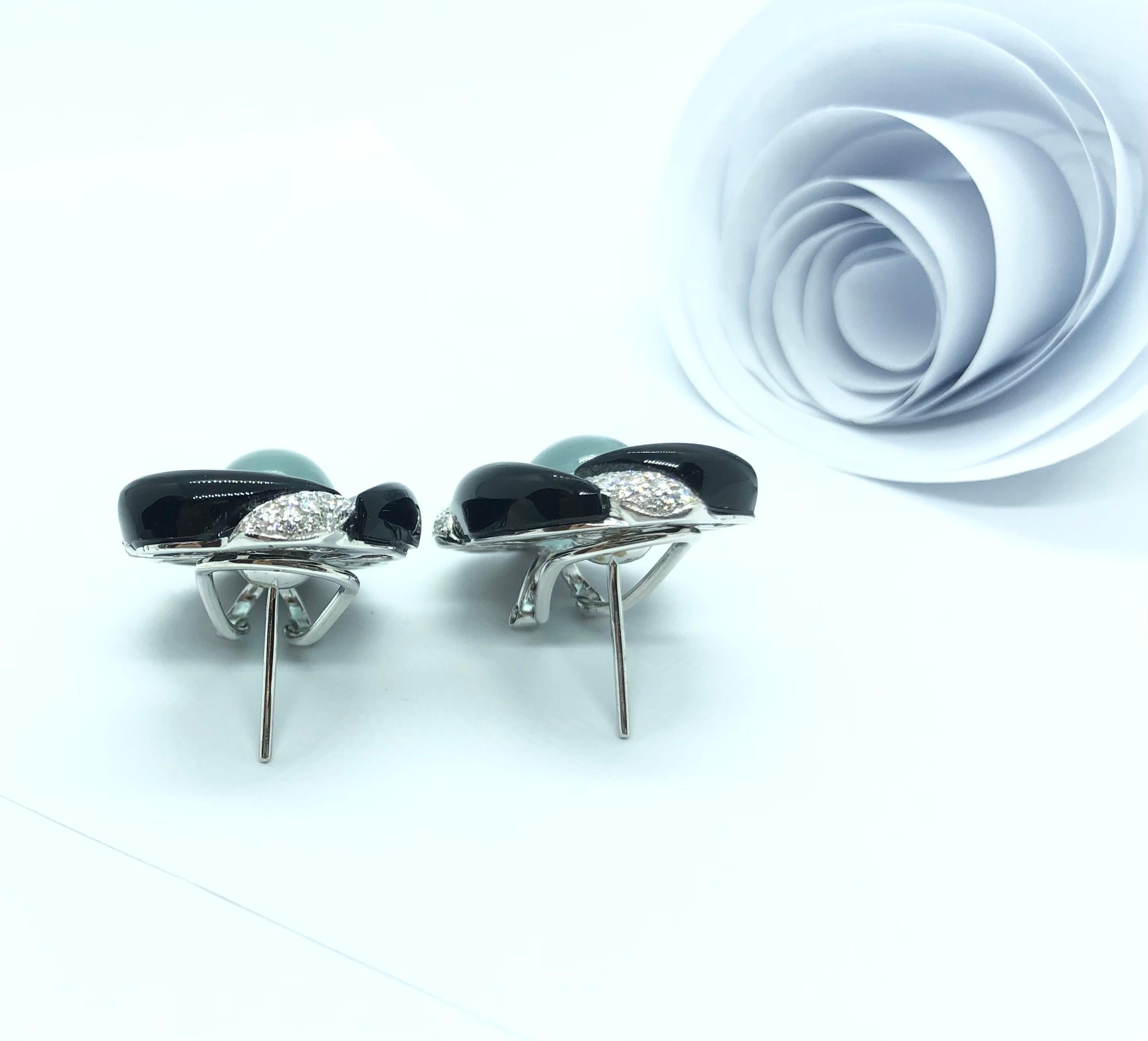 Contemporary Aquamarine with Diamond Earrings Set in 18 Karat White Gold Settings For Sale