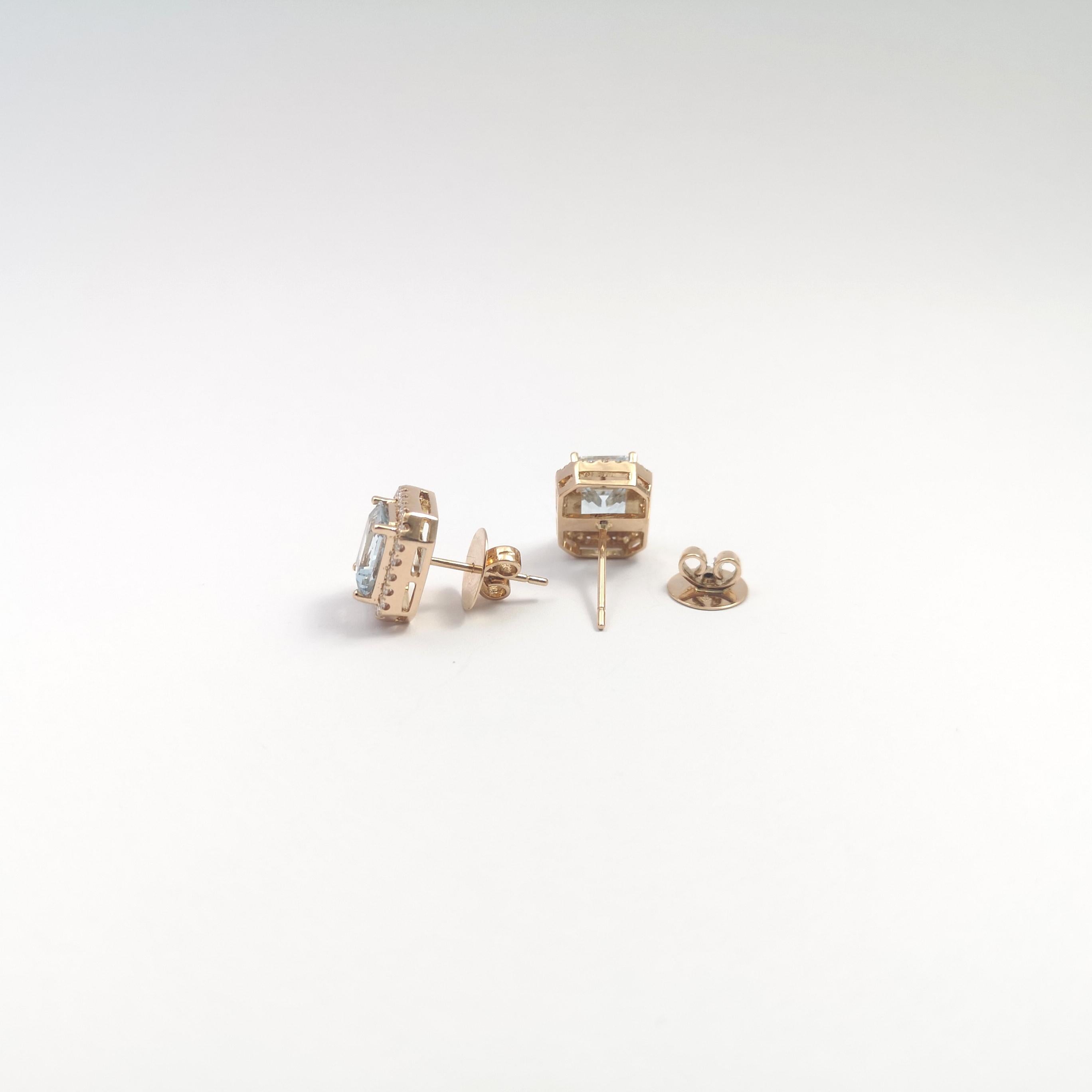 Donna Orecchini con acquamarina e diamanti incastonati in oro rosa 18K in vendita