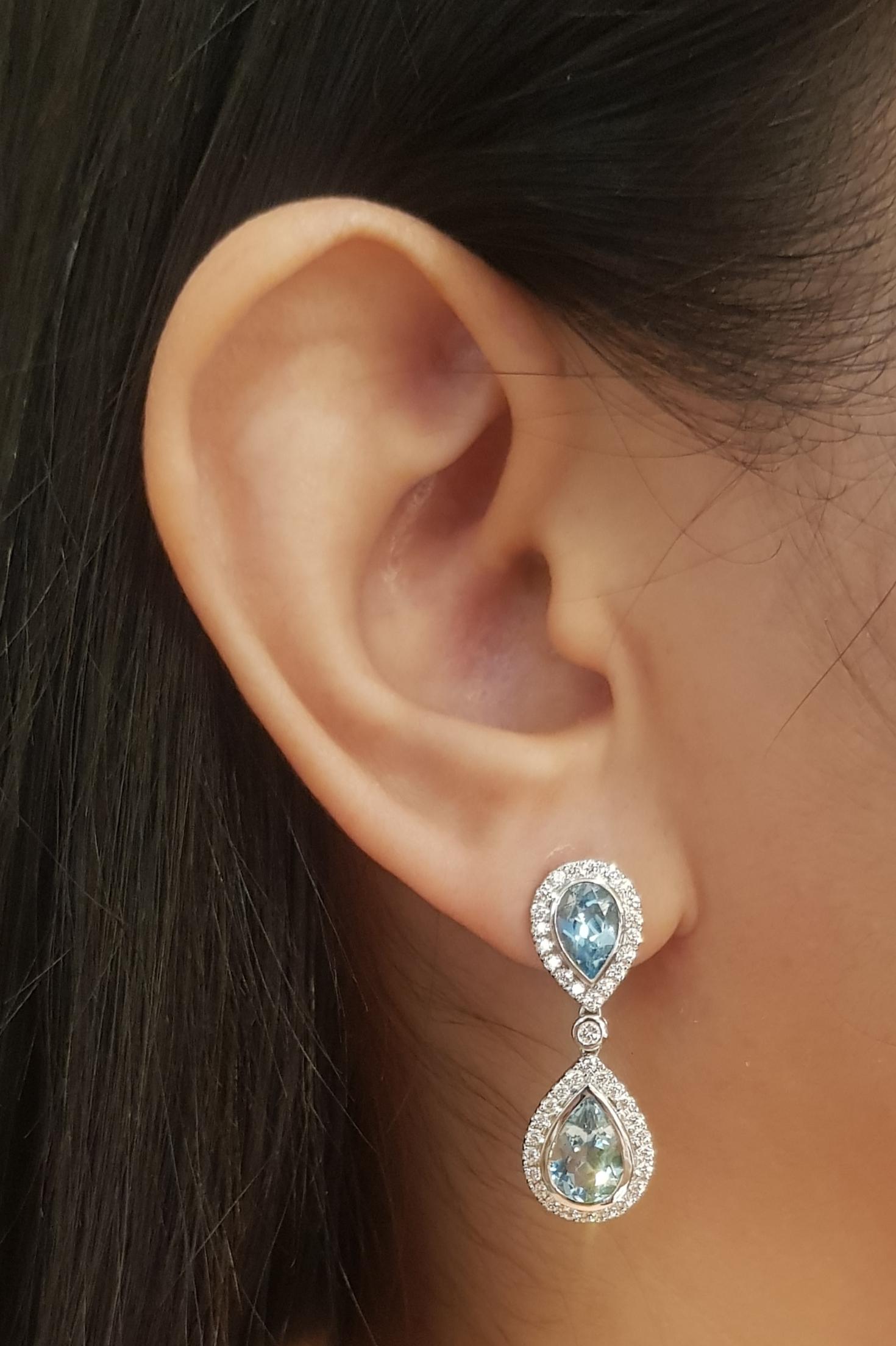 Aquamarine 3.59 carats with Diamond 0.88 carat Earrings set in 18K White Gold Settings

Width: 1.0 cm 
Length: 3.0 cm
Total Weight: 10.47 grams

