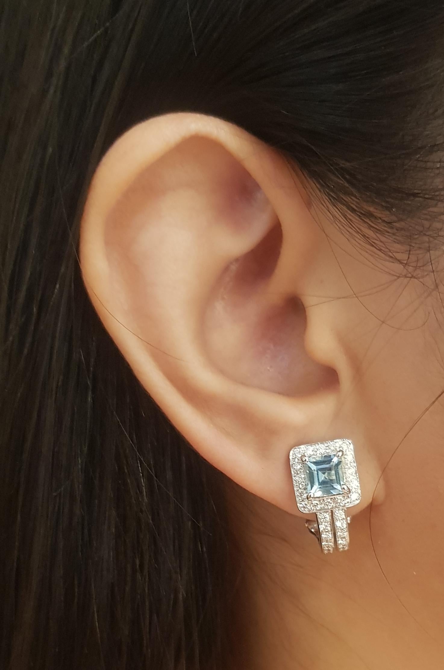 Aquamarine 1.71 carats with Diamond 0.71 carat Earrings set in 18K White Gold Settings

Width: 1.0 cm 
Length: 1.9 cm
Total Weight: 7.97 grams

