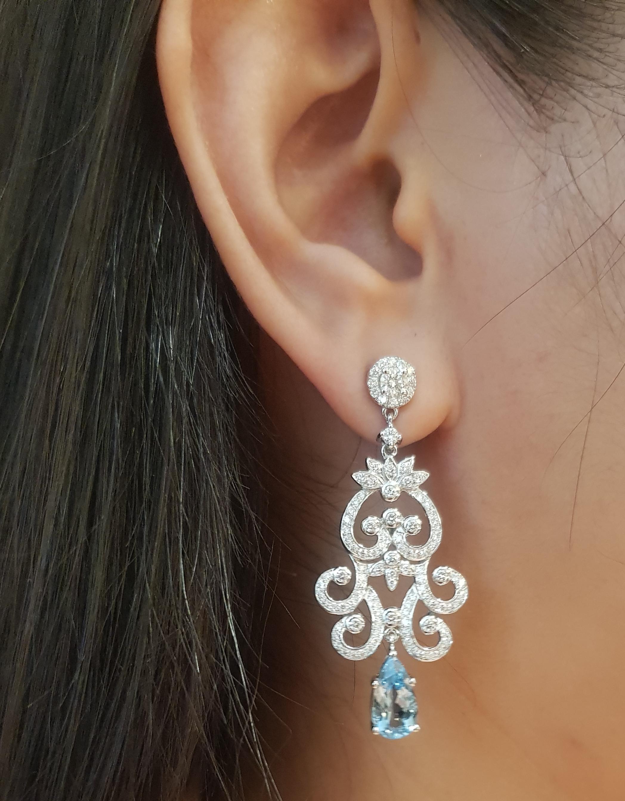 Aquamarine 3.17 carats with Diamond 1.56 carats Earrings set in 18K White Gold Settings

Width:  2.0 cm 
Length: 4.9 cm
Total Weight: 17.14 grams


