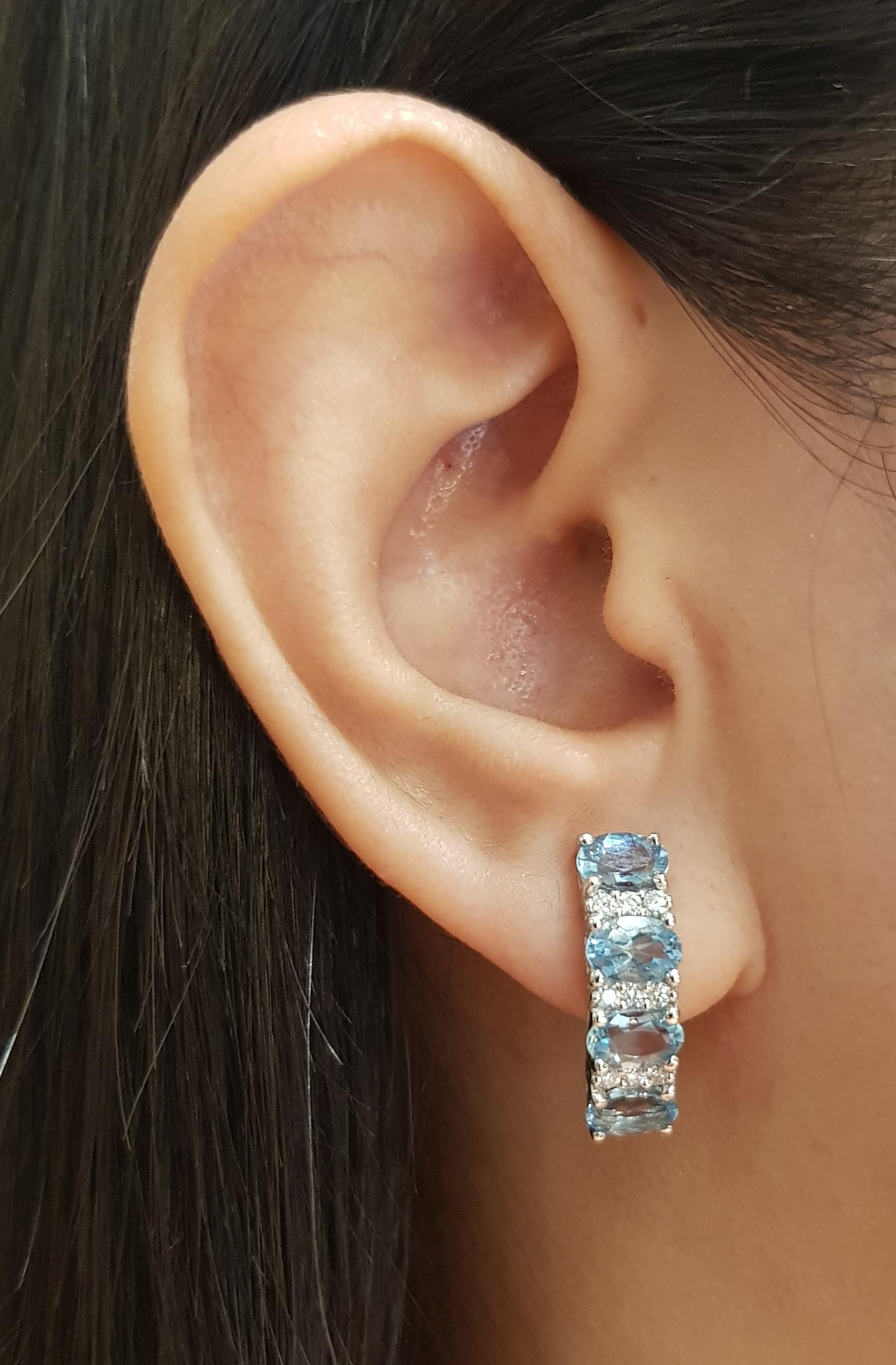 Aquamarine 3.05 carats with Diamond 0.31 carat Earrings set in 18K White Gold Settings

Width: 0.6 cm 
Length: 1.9 cm
Total Weight: 6.67 grams

