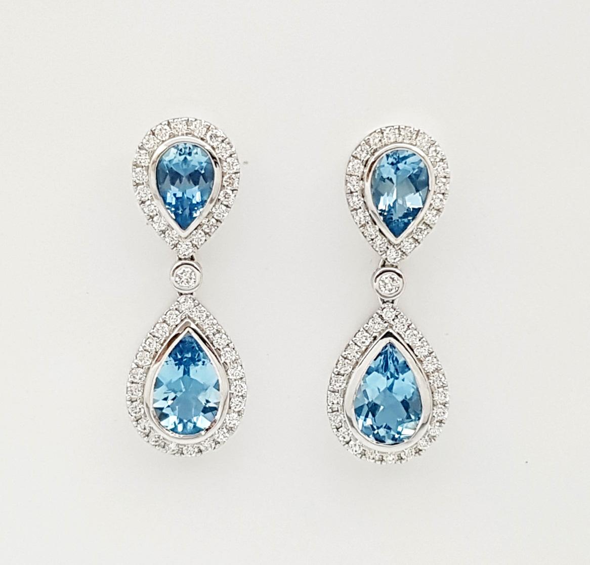 Pear Cut Aquamarine with Diamond Earrings set in 18K White Gold Settings For Sale