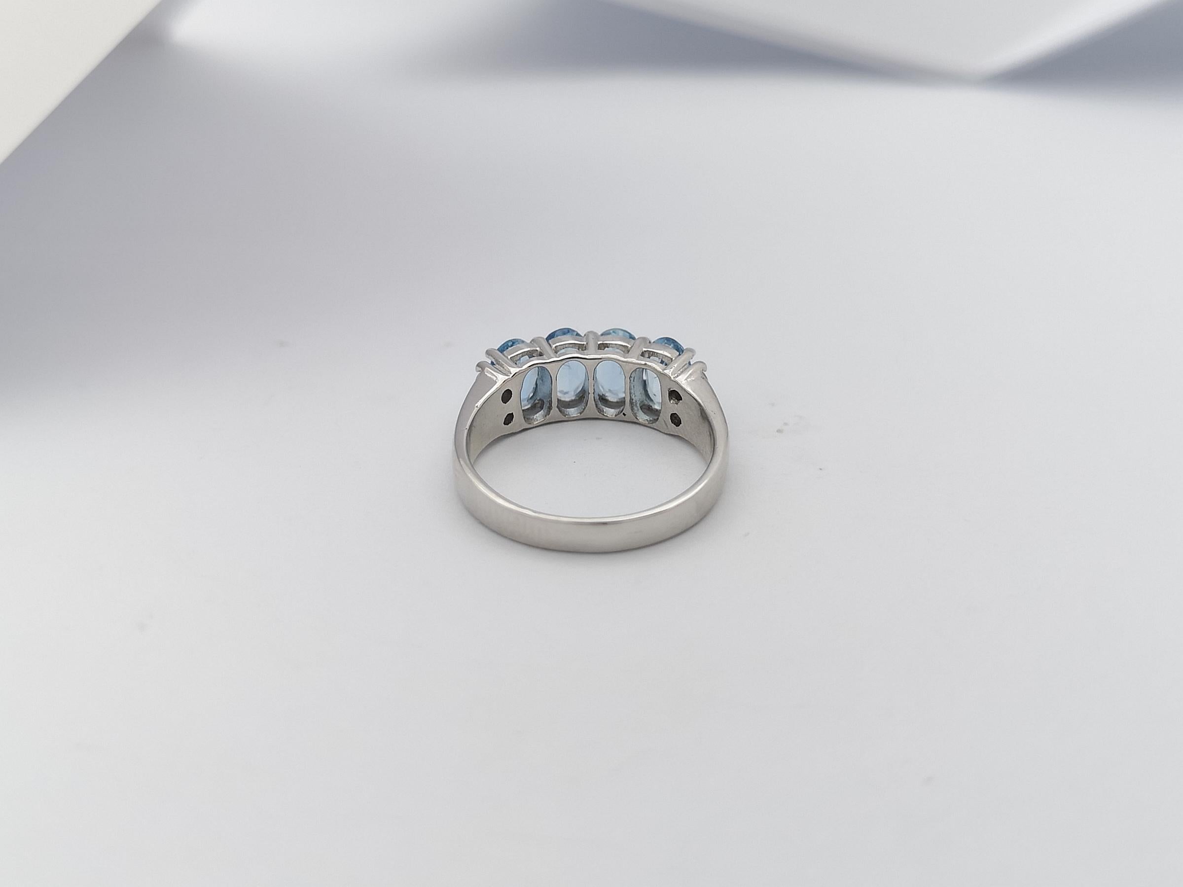 Women's Aquamarine with Diamond Ring Set in 18 Karat White Gold Settings For Sale