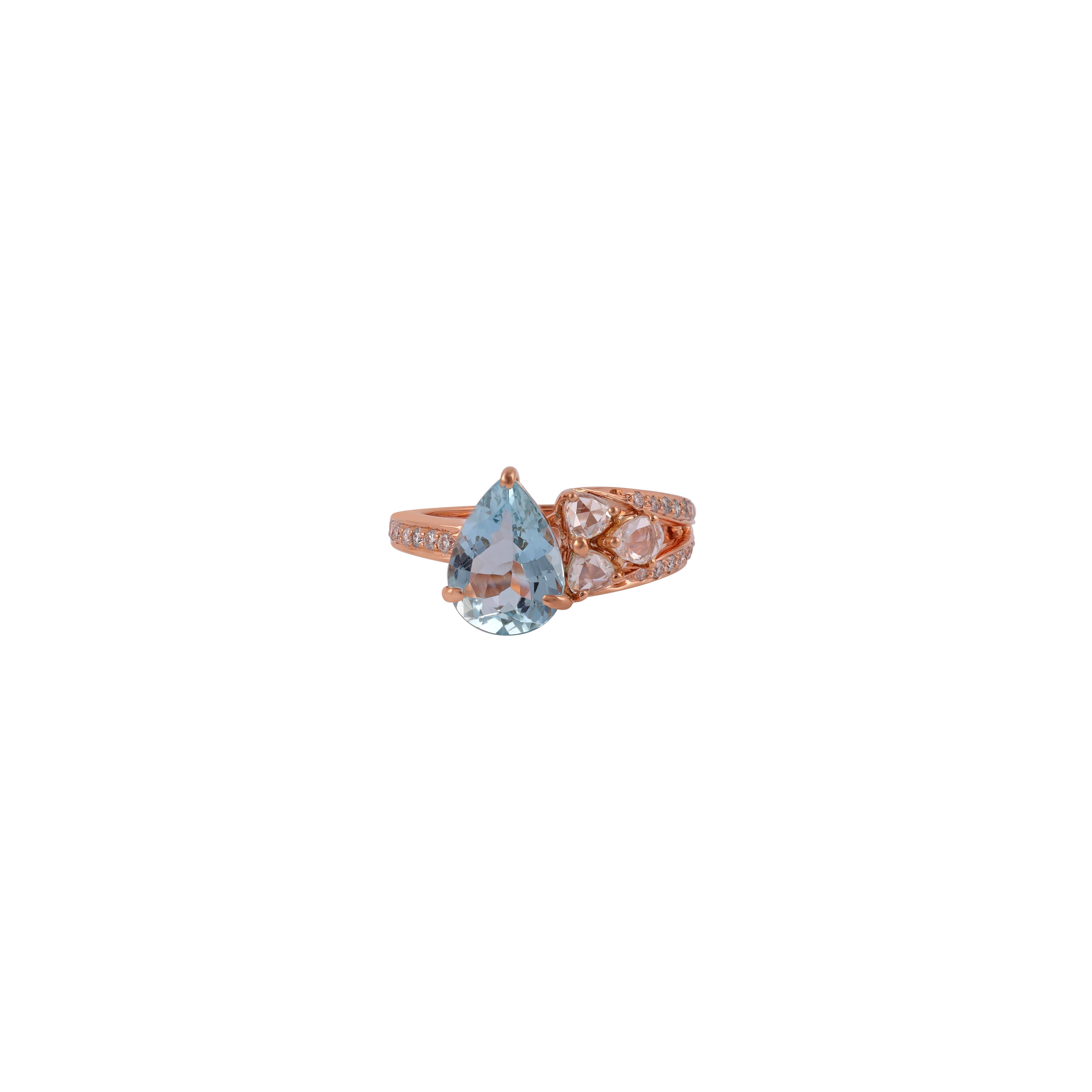 Elegant Oval Cut Aquamarine Ring  with  Sparkly Round cut & Rose Cut Diamonds in 18kt Rose Gold mounting.

Aquamarine (2.04 Carat) - Embodies the splendor of the sea, Unparalleled clarity and a soft, delicate tone which radiates life, vibrancy and
