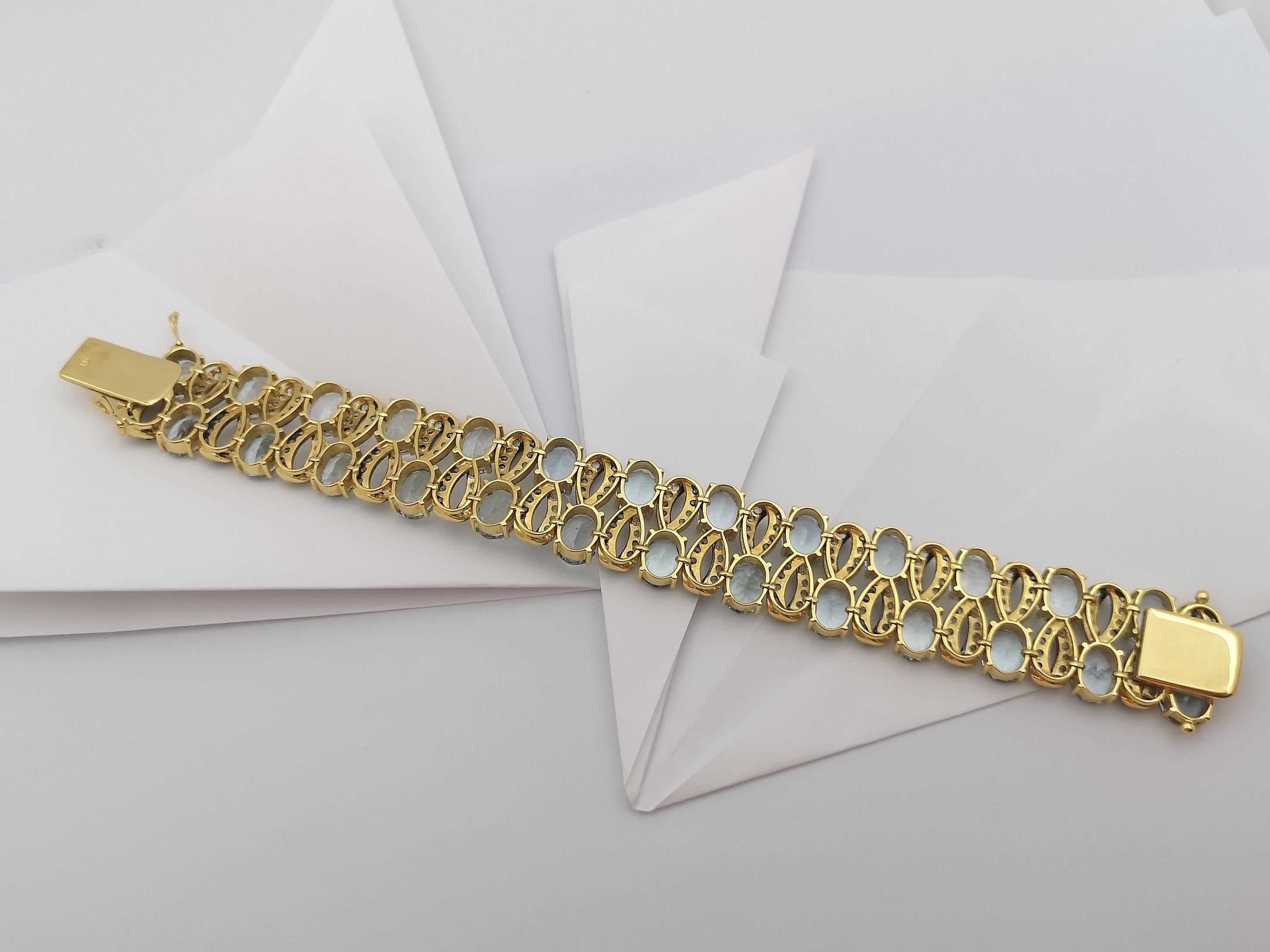 Bracelet en or 18 carats serti d'aigue-marine et de saphirs verts en vente 5